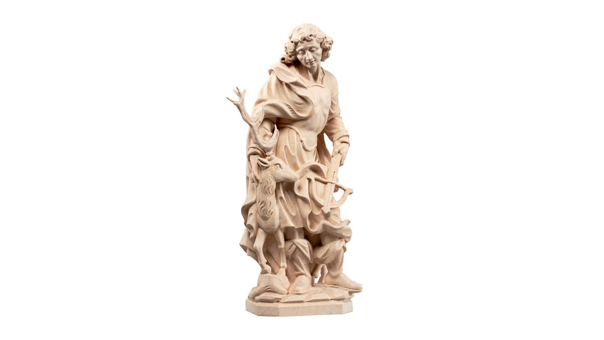 Statue en bois naturel de saint Hubert avec un cerf