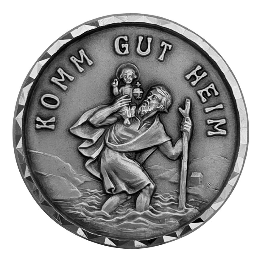 Médaille saint Christophe Ø 3,5 cm, aspect argent, bordure facettée, gravure « Komm gut heim », bénite